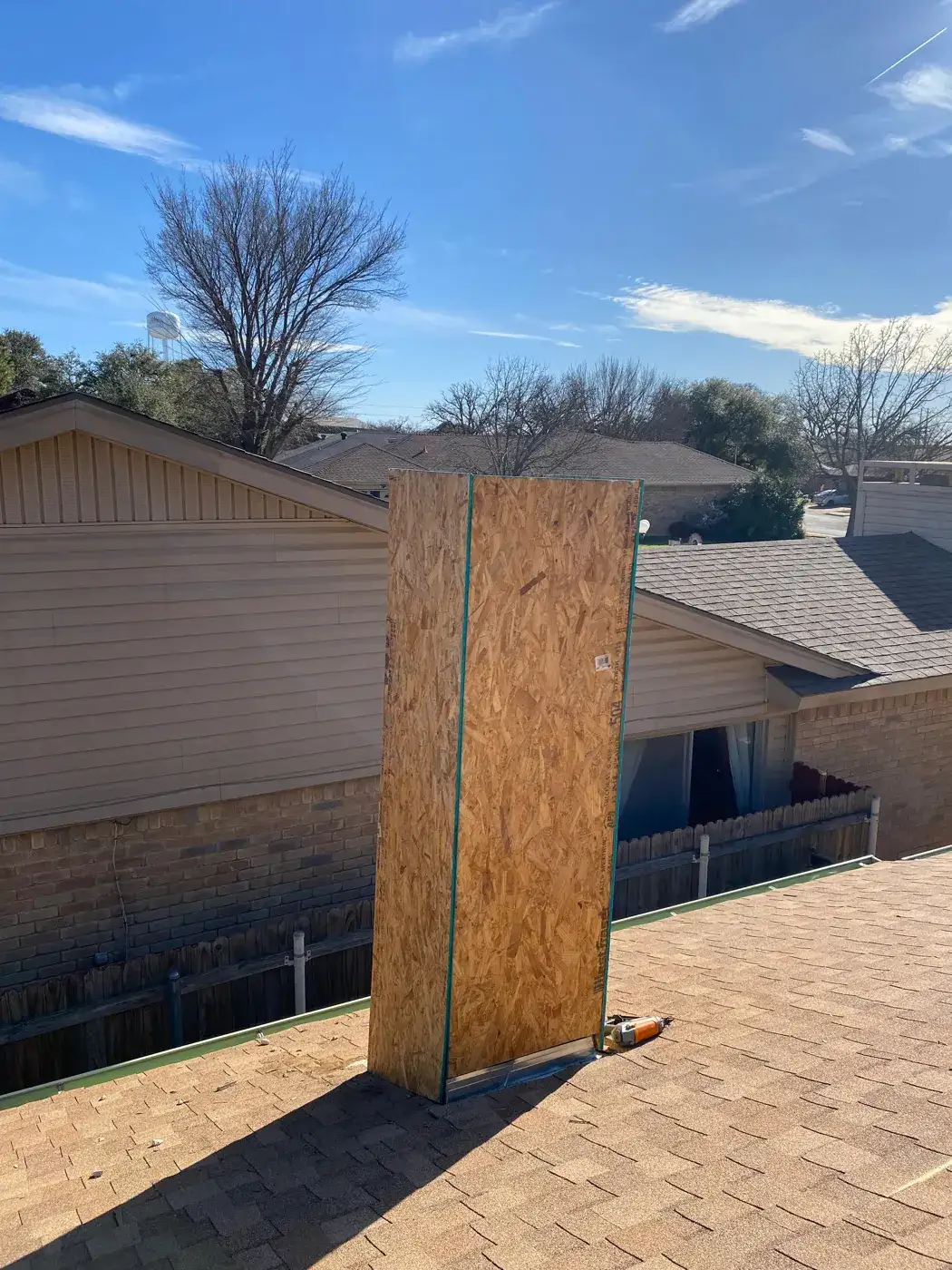 Chimney chase sheathed with new plywood